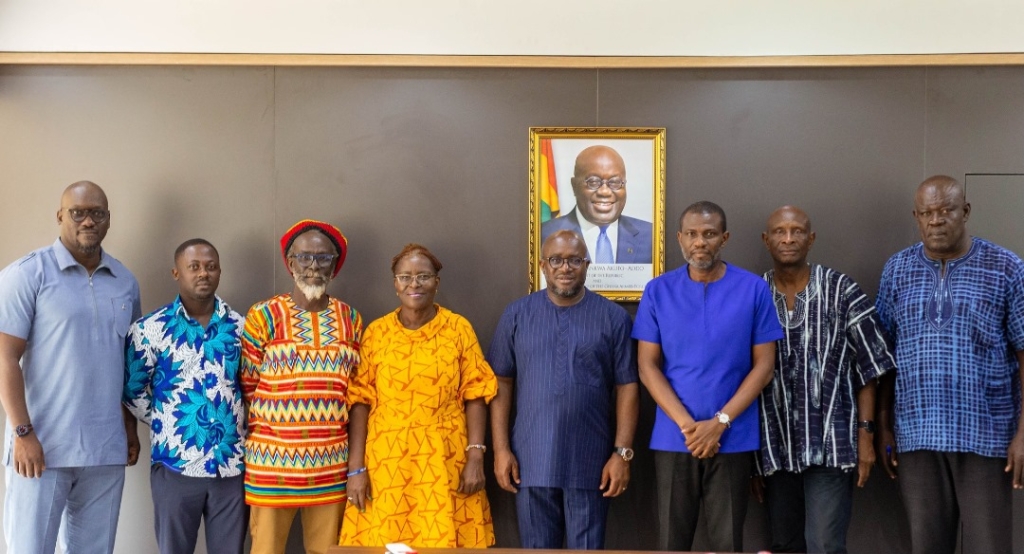 Egyapa Mercer (4th person in blue apparel from right) standing with GCF executives and Deputy Minister and Chief Director, MoTAC. [From left to right: Ken Fiati – Executive Member, Patrick Alabi – GCF Administrator, Ahuma Bosco Ocansey – GCF Vice Chair, Edwina Assan – GCF General Secretary, Hon. Mercer - Minister Designate of Tourism, Arts and Culture, Hon Mark Okraku Mantey – Deputy Minister MoTAC, John Agbeko – Chief Director MoTAC and Samuel Dodoo – GCF Executive Member]