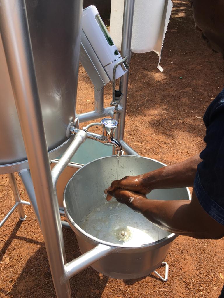 TUTAG donates mechanised hand washing machine, PPEs to institutions in Tamale TUTAG donates mechanised hand washing machine, PPEs to institutions in Tamale