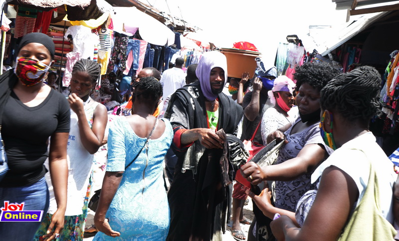 Photos: How social distancing is observed in markets