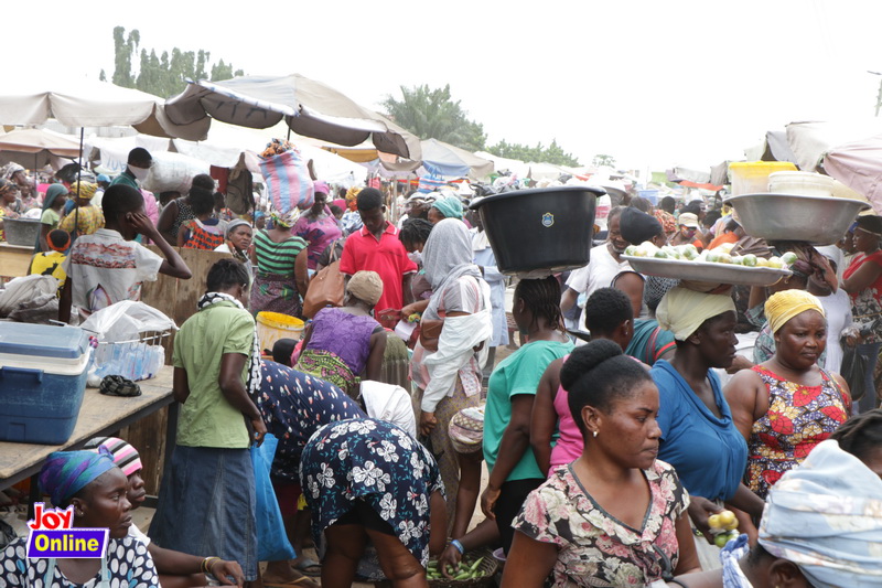 Photos: How social distancing is observed in markets