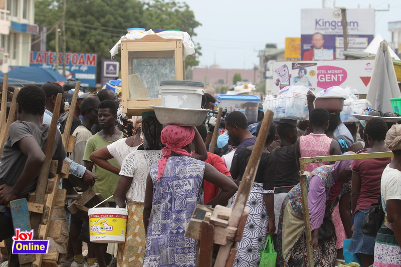 Photos: How social distancing is observed in markets