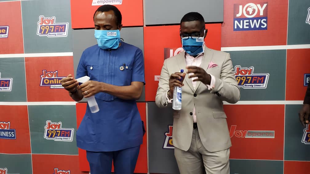 Coastal Development Authority donates face masks, sanitisers to Multimedia Group Ltd