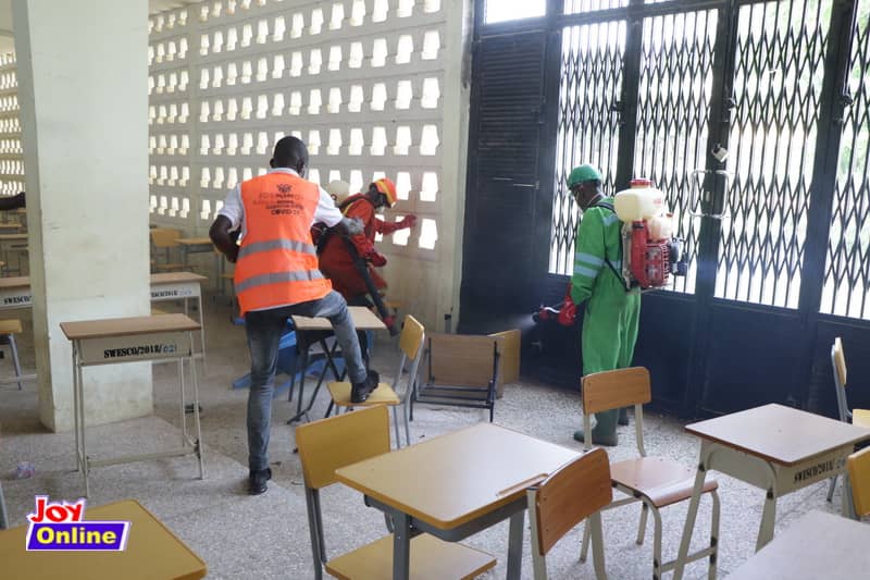 Zoomlion officers battle green mamba during disinfection exercise at Swedru SHS