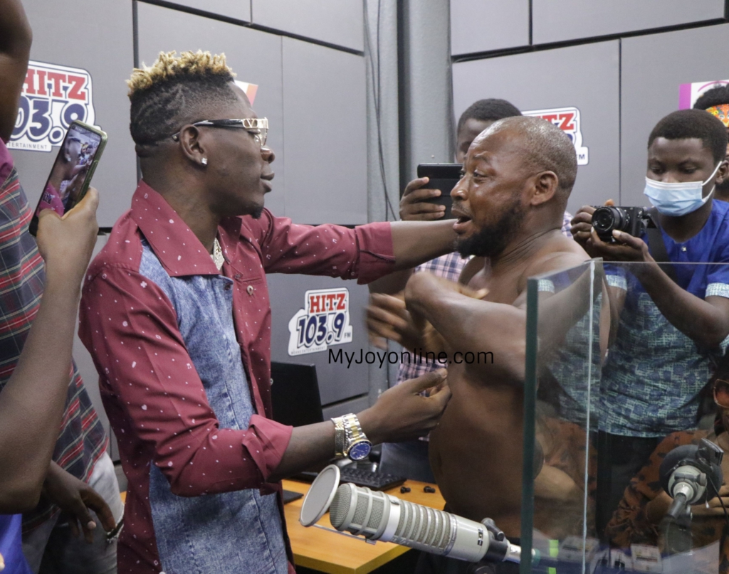 Photos of driver who abandoned his passengers to follow his idol Shatta Wale