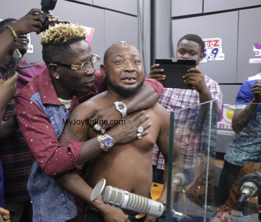 Photos of driver who abandoned his passengers to follow his idol Shatta Wale