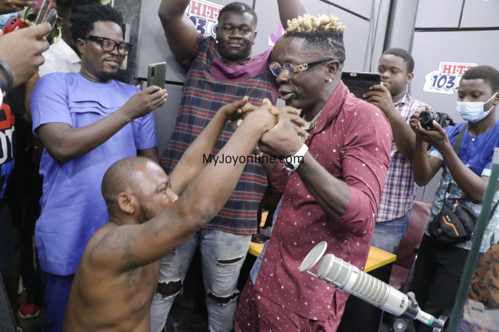 Photos of driver who abandoned his passengers to follow his idol Shatta Wale