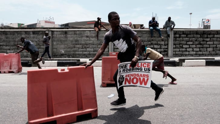 In the wake of tumultuous #EndSARS demonstrations, Nigerian photographers tell a story of strength and hope