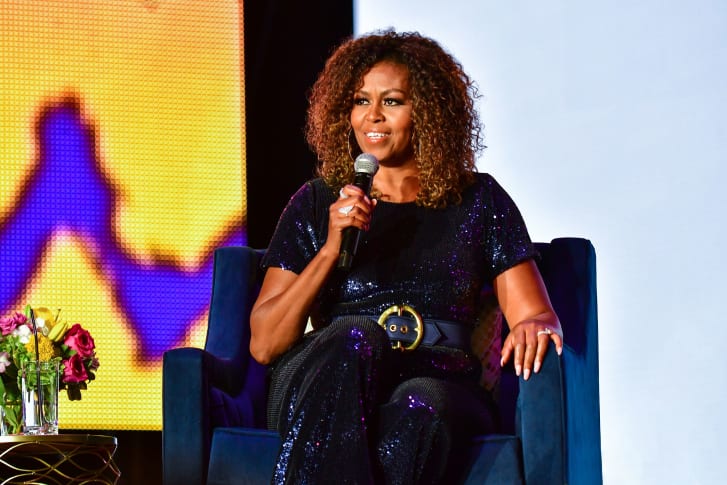 Michelle Obama wows US presidential inauguration in head-to-toe plum and burgundy