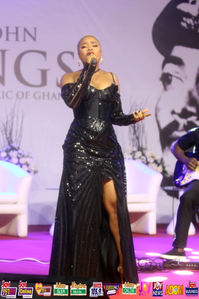 Adina breaks down while performing at Rawlings' vigil