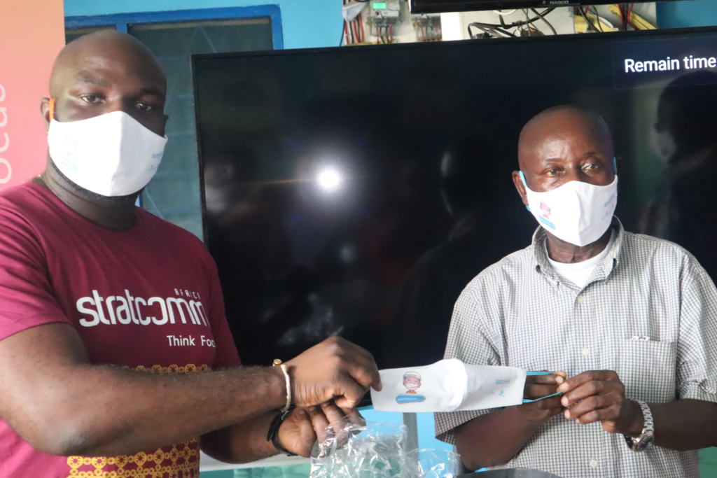 Stratcomm Africa drives home Covid-19 prevention message: Donates facemasks to trotro drivers and mates