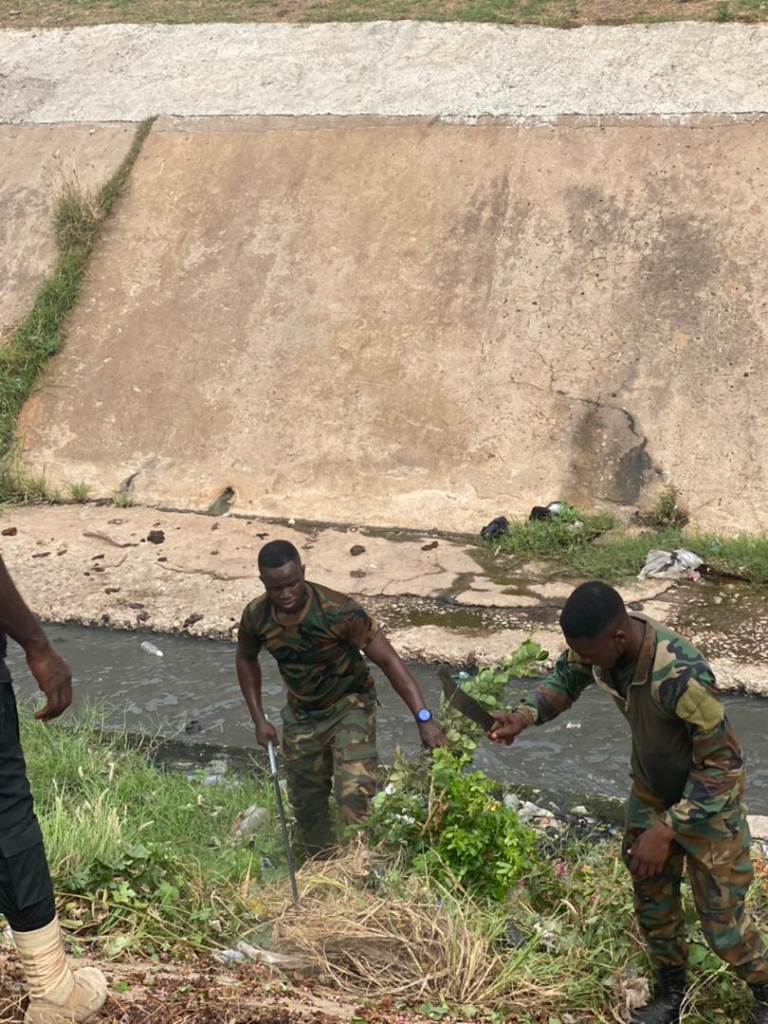 Military, police officers and others partake in clean up exercise in Accra