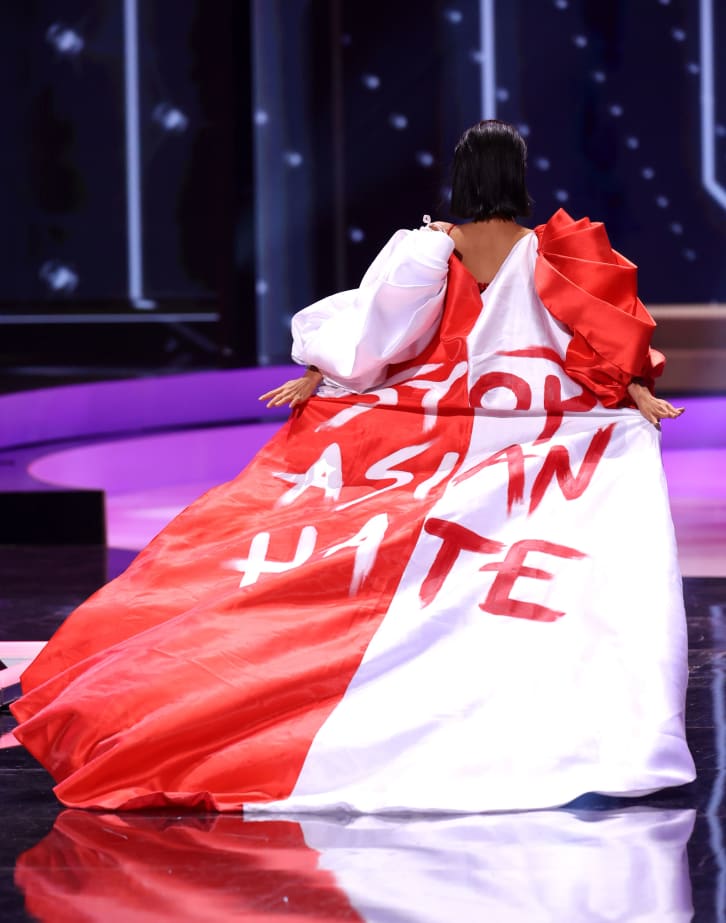 Miss Universe contestants unveil protest messages in politically charged pageant