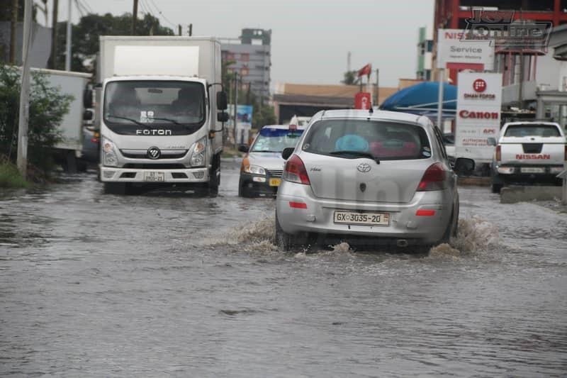 Photos: 15 minutes of rainfall throws up plastic waste from Nima gutter