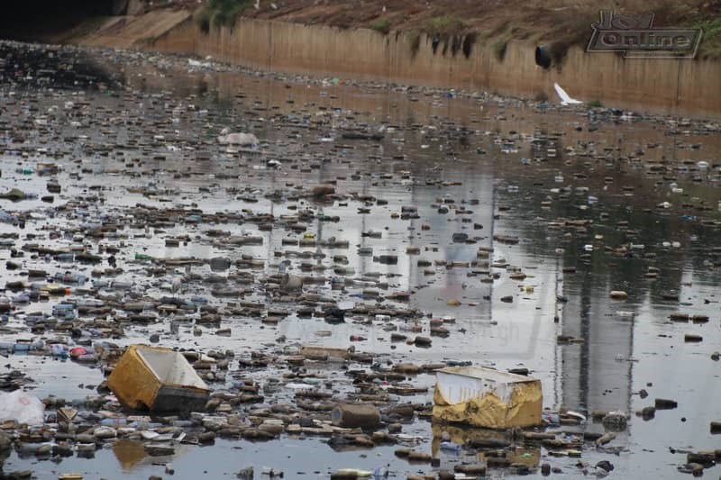 Photos: 15 minutes of rainfall throws up plastic waste from Nima gutter