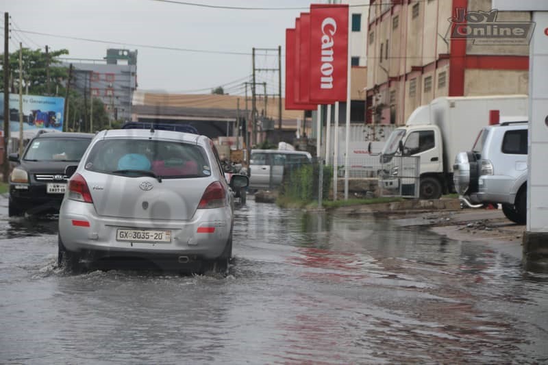 Photos: 15 minutes of rainfall throws up plastic waste from Nima gutter