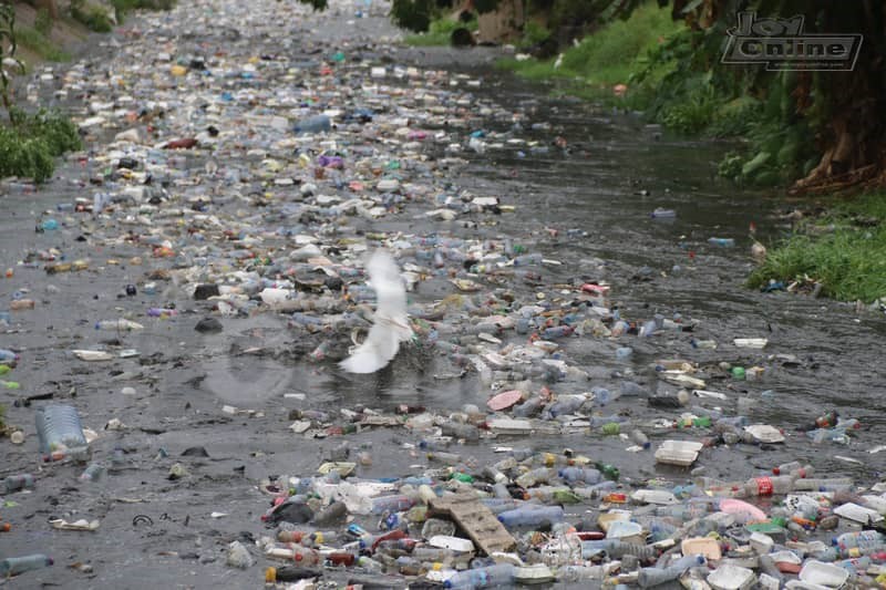 Photos: 15 minutes of rainfall throws up plastic waste from Nima gutter Photos: 15 minutes of rainfall throws up plastic waste from Nima gutter