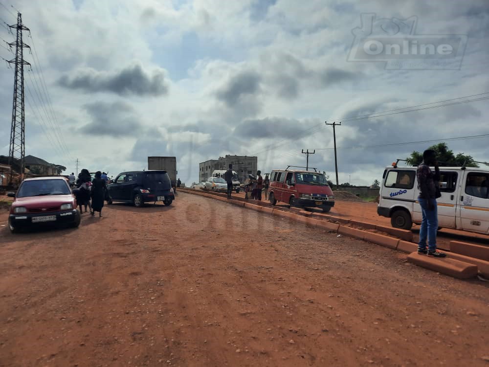 Residents of Atwima Kwanwoma block major road while in protest over stalled construction Residents of Atwima Kwanwoma block major road while in protest over stalled construction