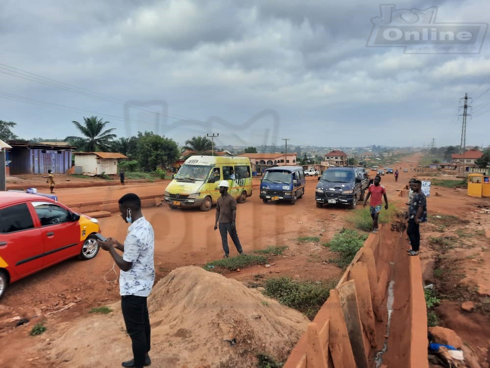Residents of Atwima Kwanwoma block major road while in protest over stalled construction Residents of Atwima Kwanwoma block major road while in protest over stalled construction