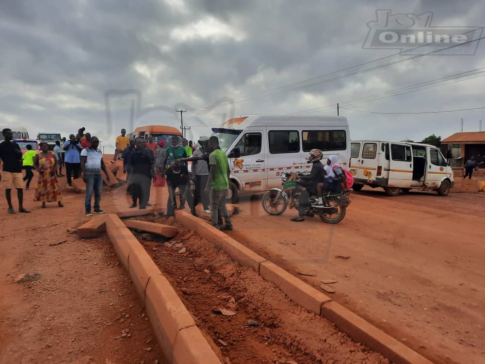 Residents of Atwima Kwanwoma block major road while in protest over stalled construction Residents of Atwima Kwanwoma block major road while in protest over stalled construction