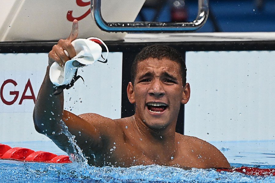 Tokyo Olympics Tunisia's Hafnaoui wins shock swimming gold