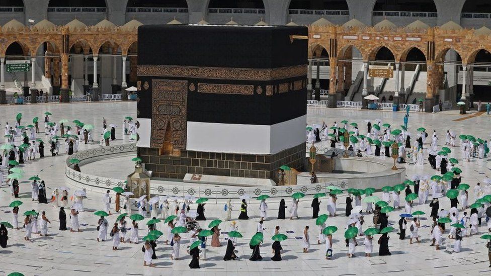 In pictures: Masks and social distancing at downsized Hajj
