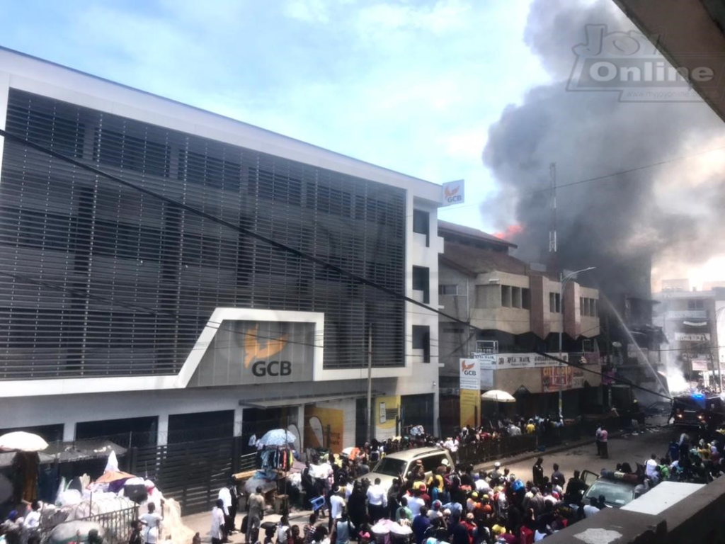 Photos: Fire destroys shops at Makola market