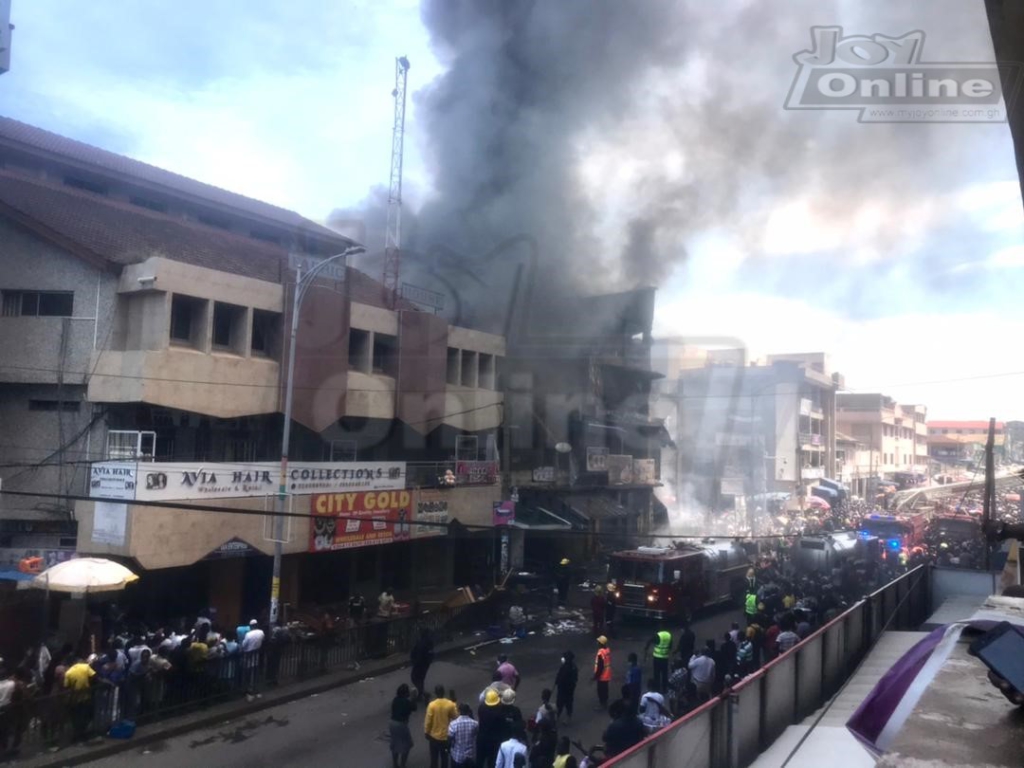 Photos: Fire destroys shops at Makola market