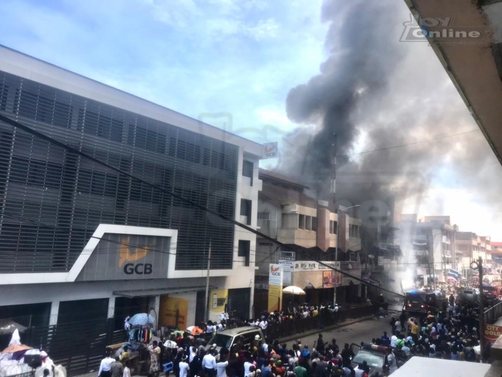 Photos: Fire destroys shops at Makola market