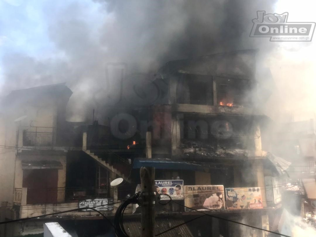 Photos: Fire destroys shops at Makola market