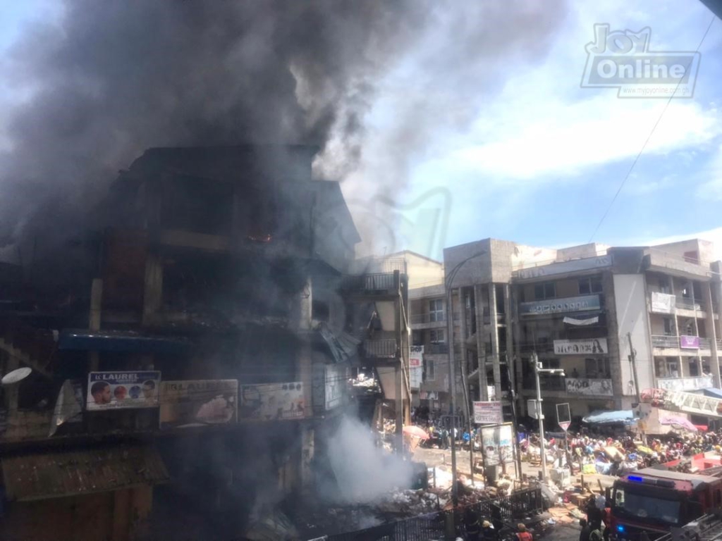 Photos: Fire destroys shops at Makola market