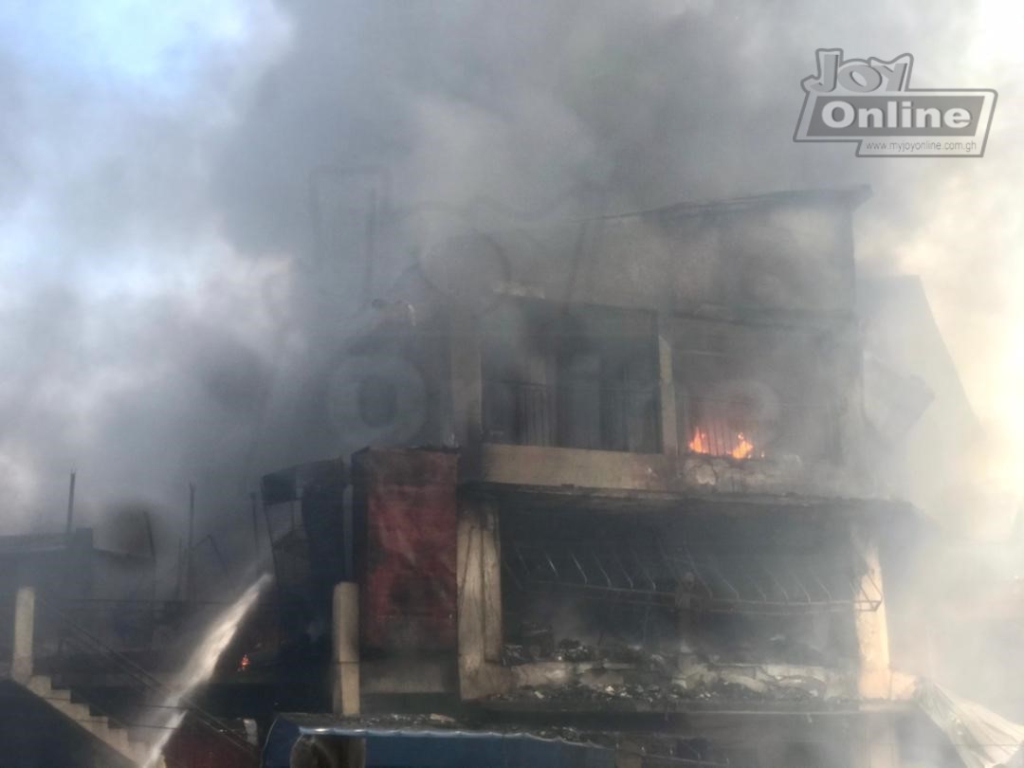 Photos: Fire destroys shops at Makola market