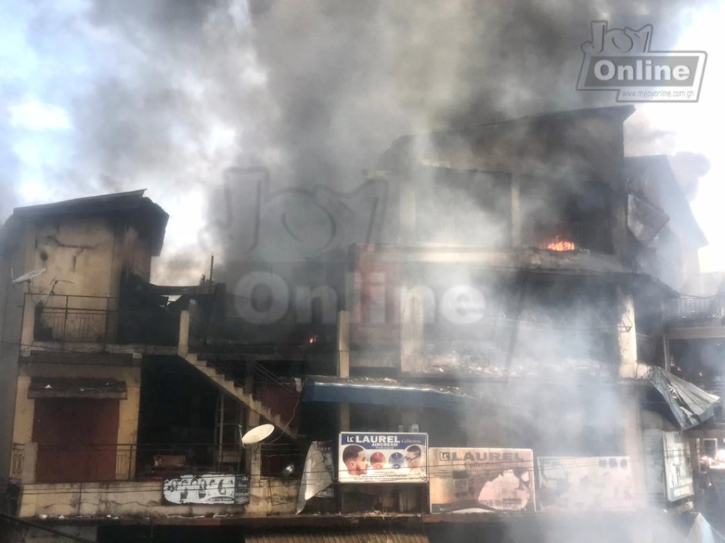 Photos: Fire destroys shops at Makola market