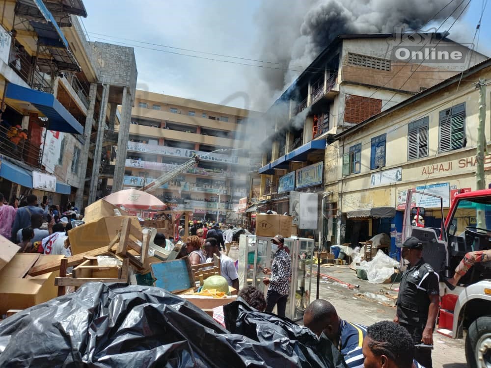 Photos: Fire destroys shops at Makola market