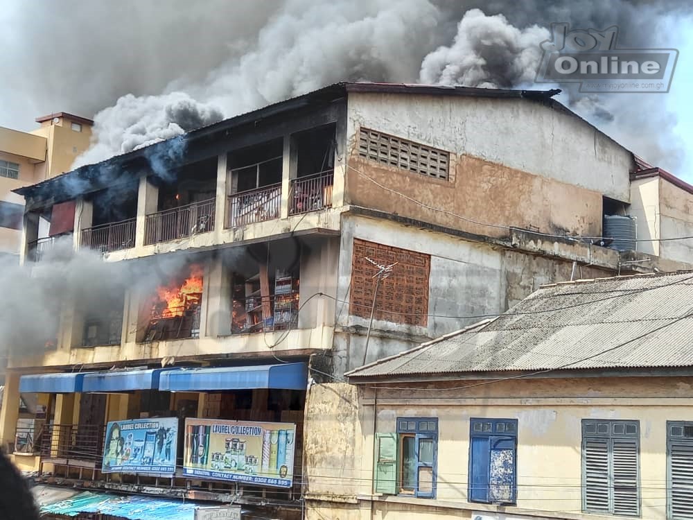 Photos: Fire destroys shops at Makola market