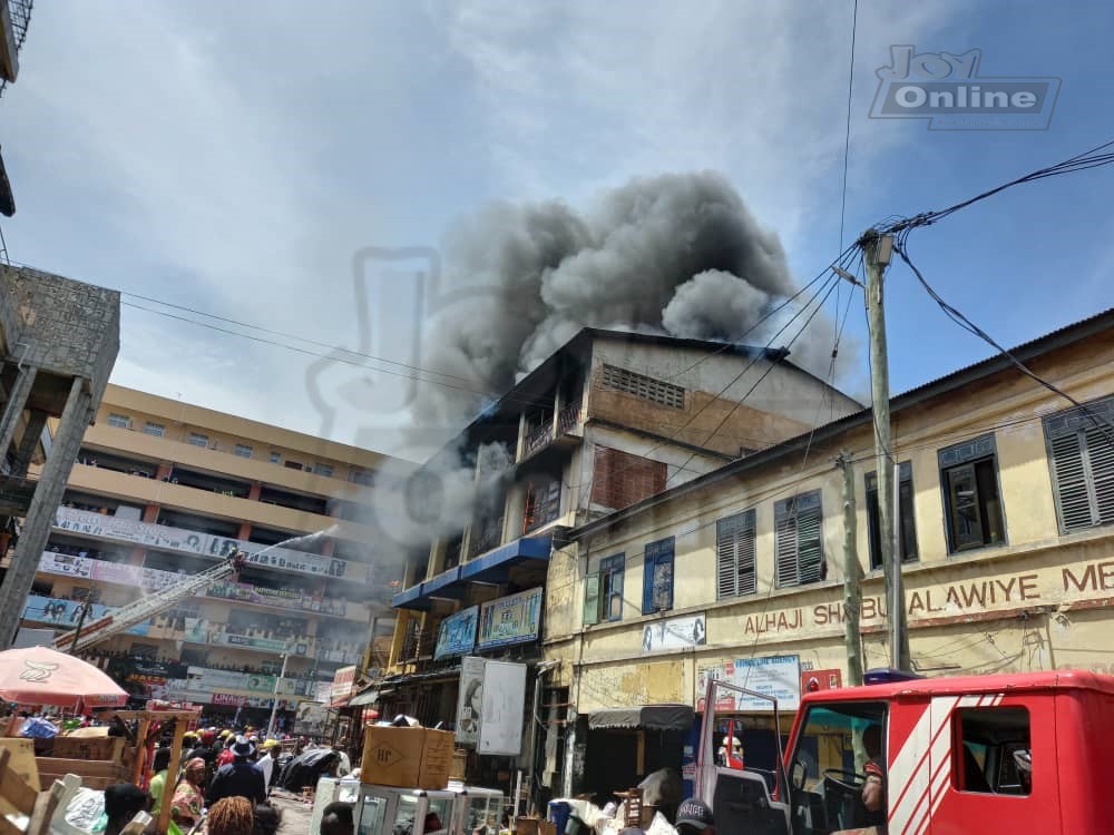 Photos: Fire destroys shops at Makola market