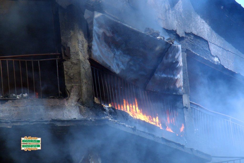 Photos: Fire destroys shops at Makola market