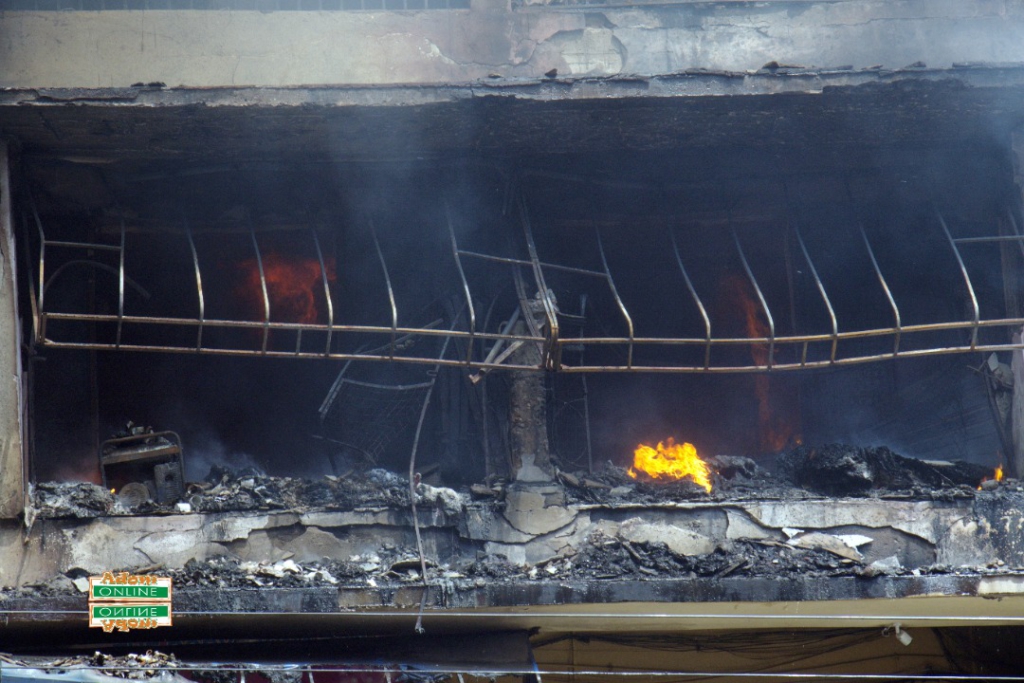 Photos: Fire destroys shops at Makola market