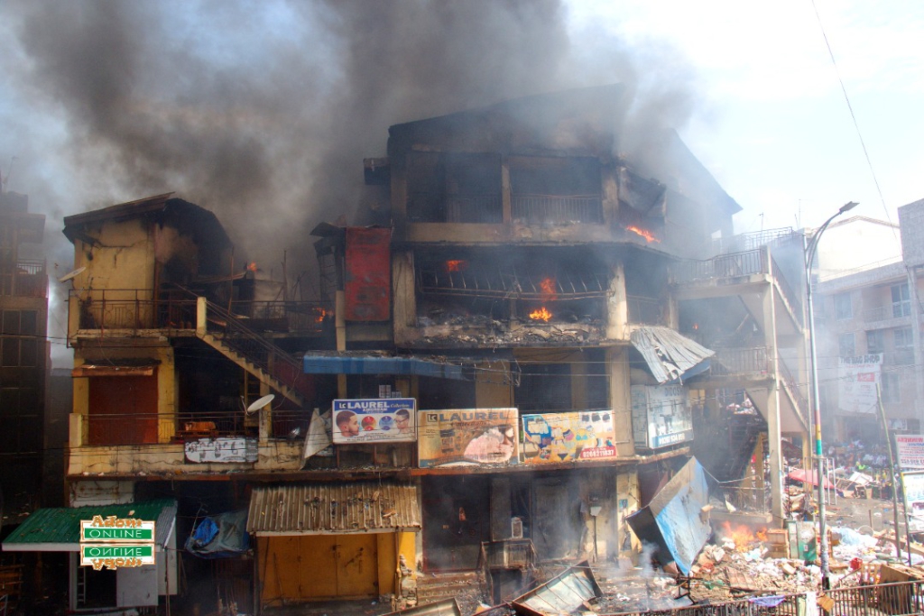 Photos: Fire destroys shops at Makola market