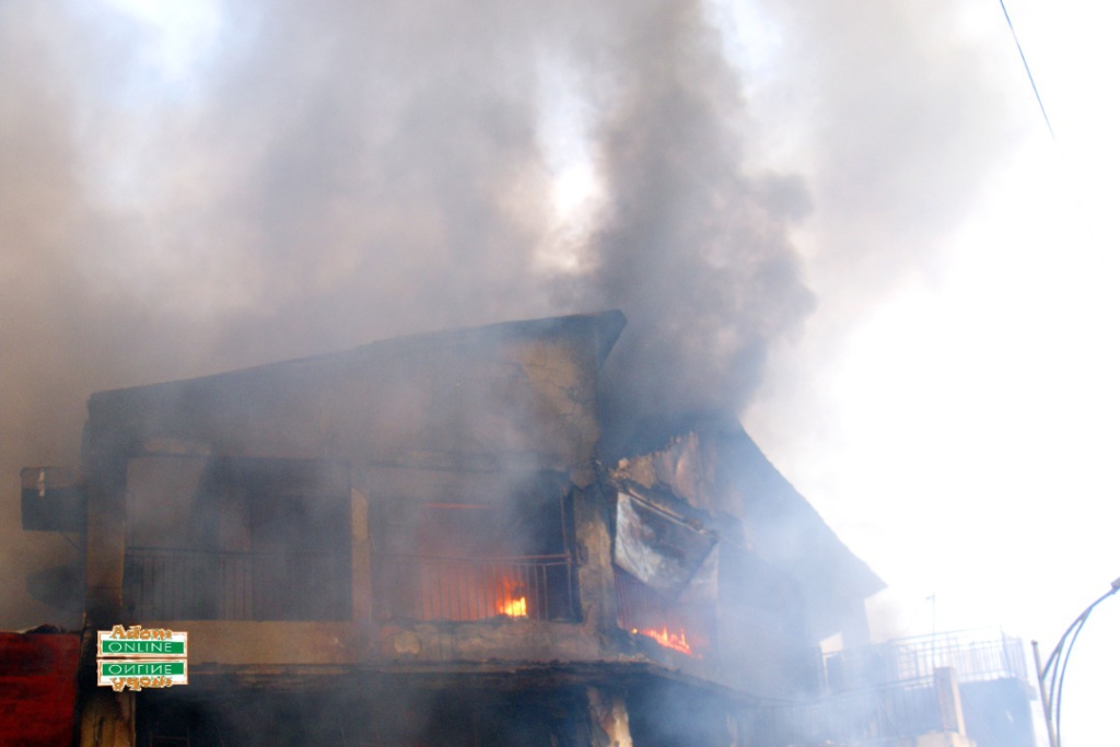 Photos: Fire destroys shops at Makola market