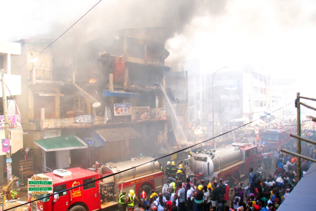 Photos: Fire destroys shops at Makola market