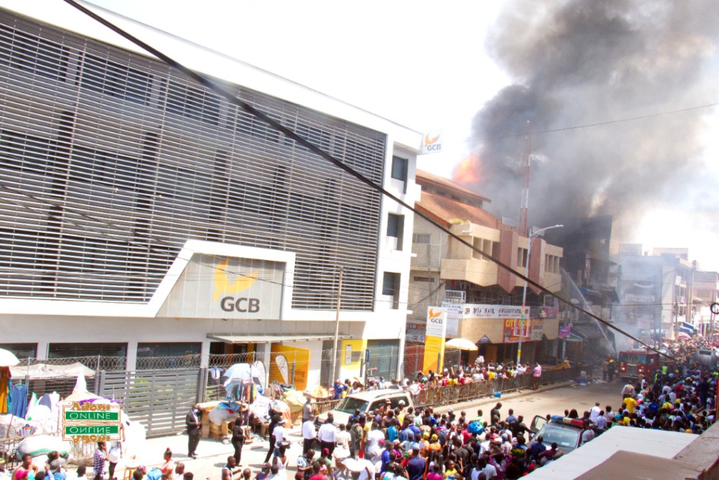 Photos: Fire destroys shops at Makola market