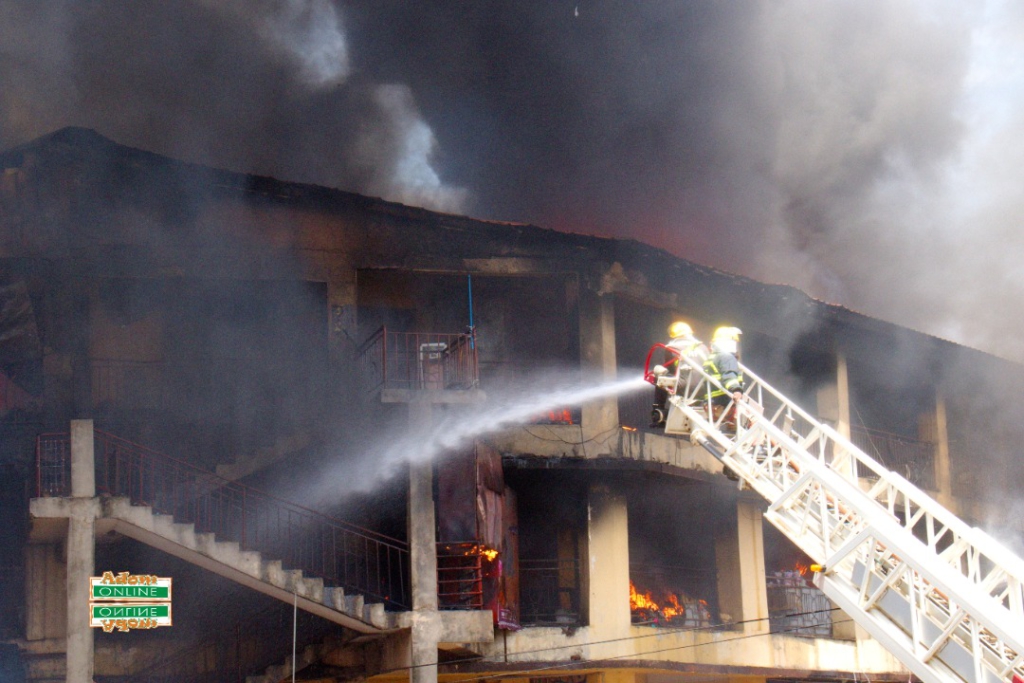 Photos: Fire destroys shops at Makola market