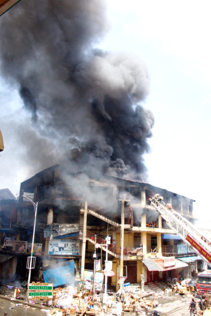 Photos: Fire destroys shops at Makola market