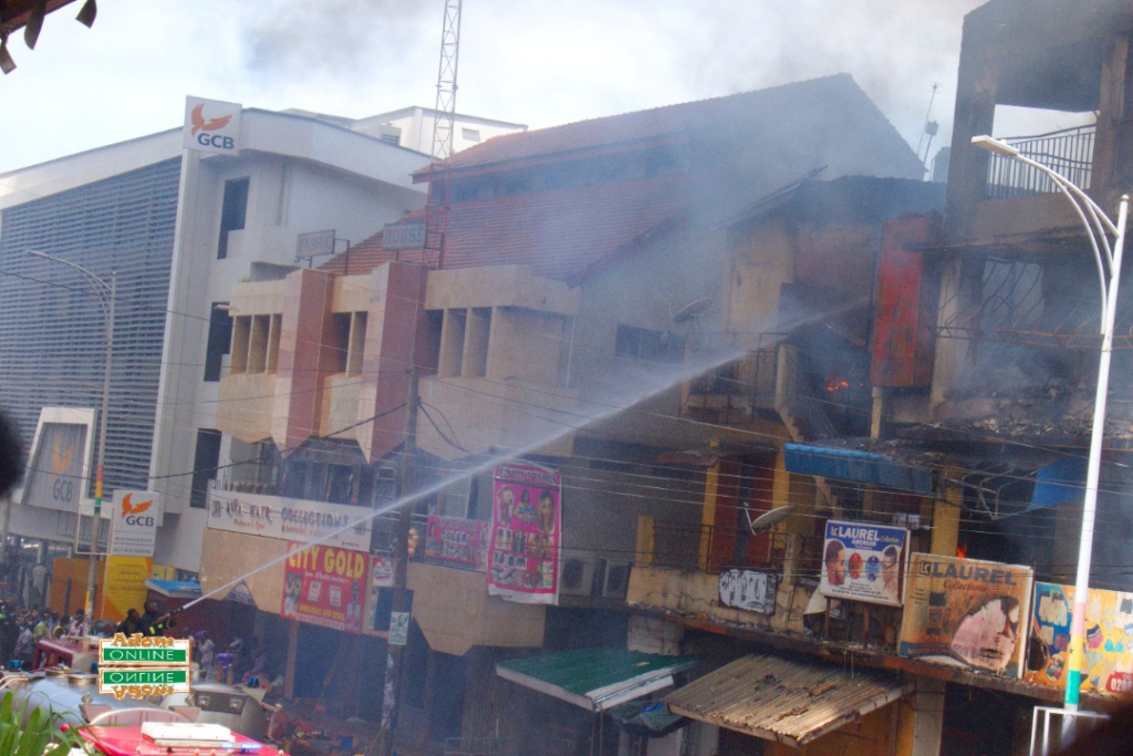 Photos: Fire destroys shops at Makola market