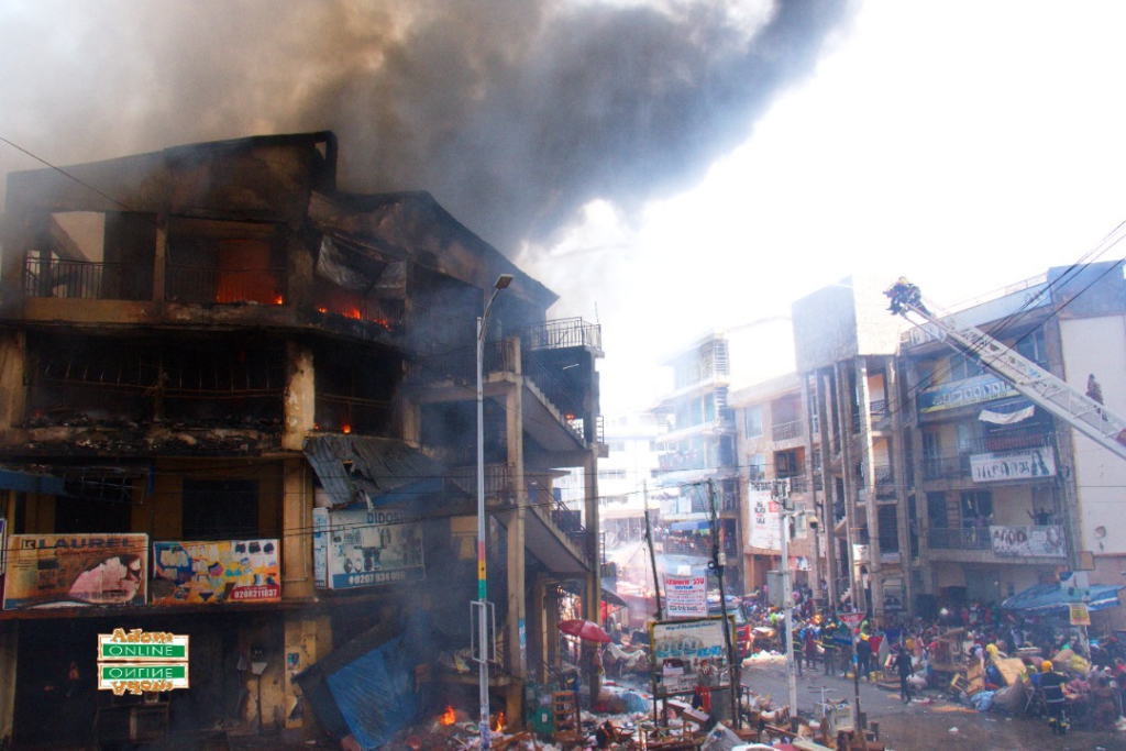 Photos: Fire destroys shops at Makola market