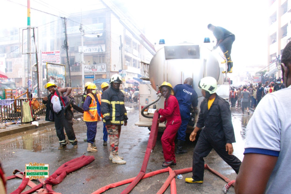 Photos: Fire destroys shops at Makola market