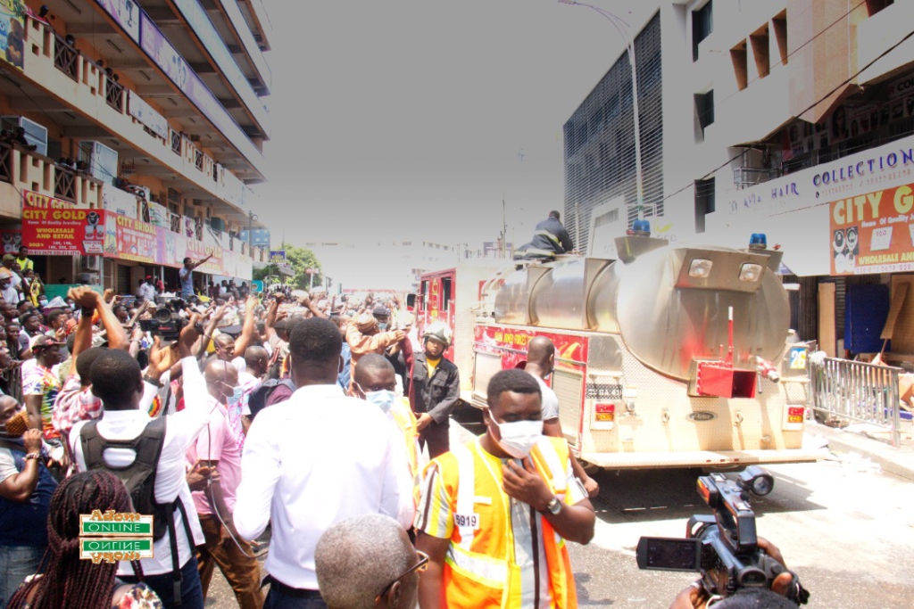 Photos: Fire destroys shops at Makola market