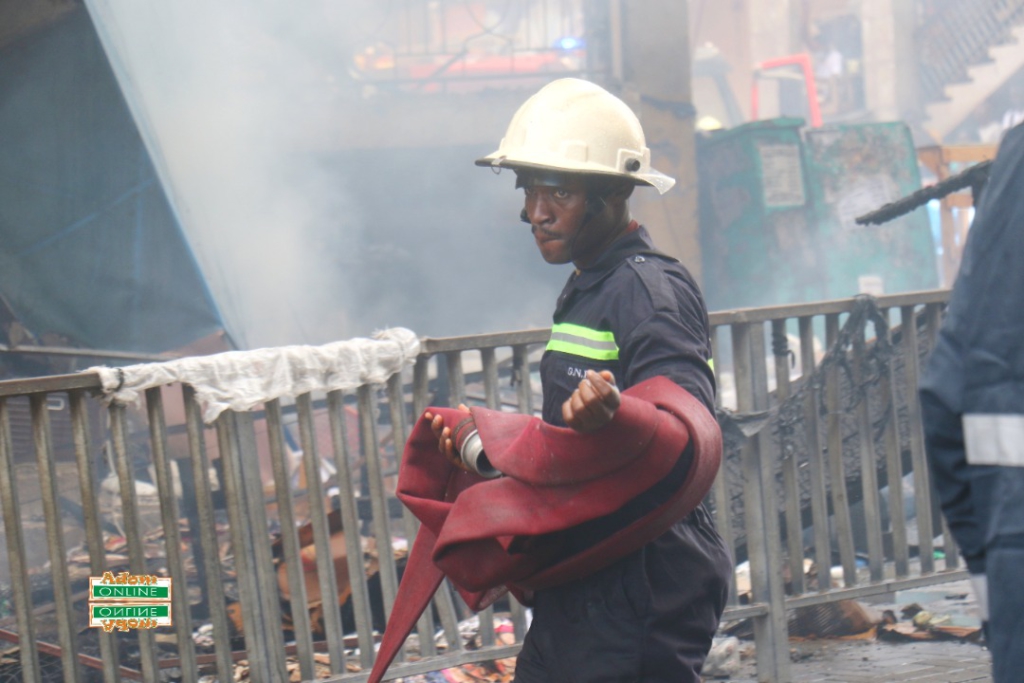 Photos: Fire destroys shops at Makola market