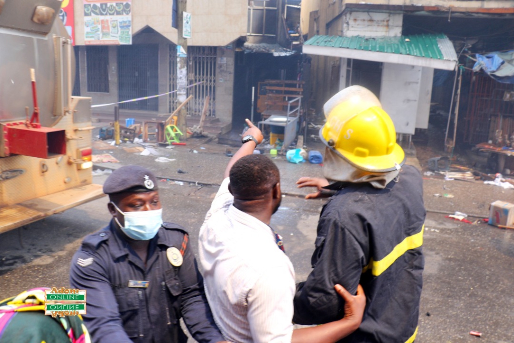 Photos: Fire destroys shops at Makola market