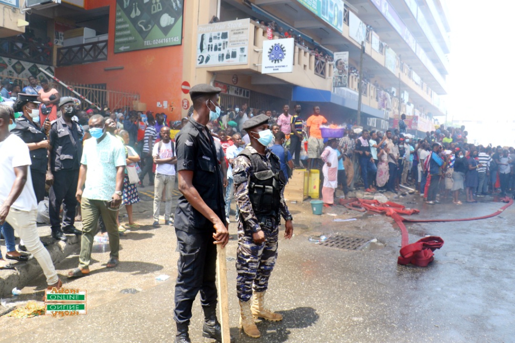 Photos: Fire destroys shops at Makola market